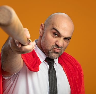 a man in a red cape capelet and a baseball bat