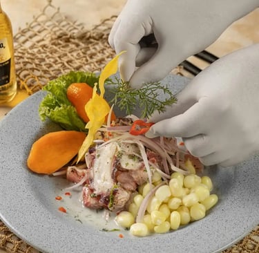 the preparation of a dish of ceviche seafood in Lima Ceviche Bar Restaurant in Lisbon, Portugal