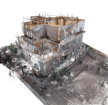 Detailed 3D point cloud scan of a multi-story building and surrounding yard using LiDAR technology.