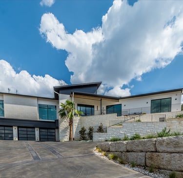 a house with a driveway and a driveway with a driveway