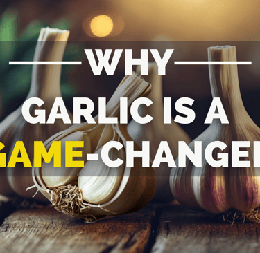 Three garlic bulbs on a wooden surface, one sliced to reveal the inside.