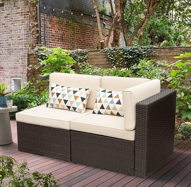 Modern beige patio furniture corner sofa and armless seat in backyard