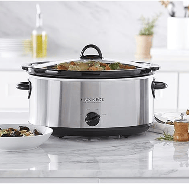 Crock-Pot 7 Quart Slow Cooker filled with a hearty beef stew ready to serve a large family.