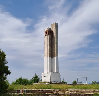 a monument tower with a star on top of it