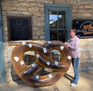 Hannah (Next Vacation Tours & Travel) at Julius Sturgis Pretzel Bakery in Lititz, Pennsylvania