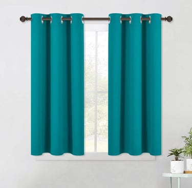 a curtain with a curtain in the middle of a room