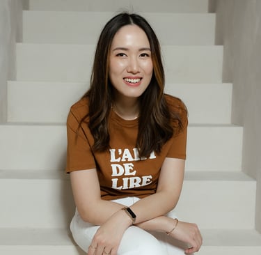 a woman sitting on a staircase case