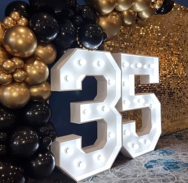 Gold Shimmer Wall featured at a 35Th Anniversary in Wynnum, Brisbane - party hire by SweetAz Co.