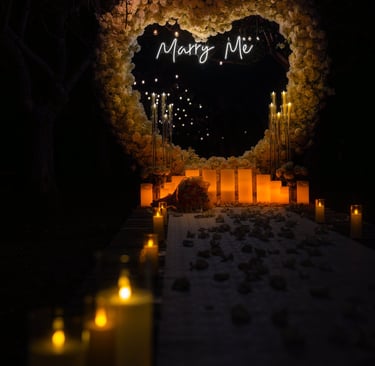 a ring bearer box with a ring on top of a rock