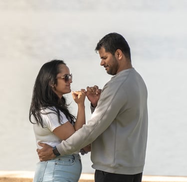 a man and woman standing next to each other