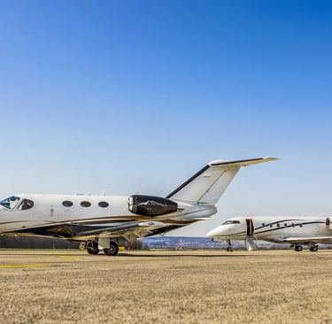 Citation Mustang & Challenger 350 sitting on a hot ramp waiting for their next customers