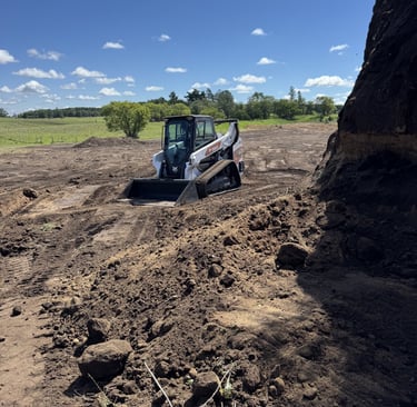 skid-steer-moving-dirt.jpg