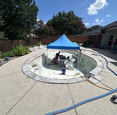 Travertine coping was custom cut for each angle during a pool remodel