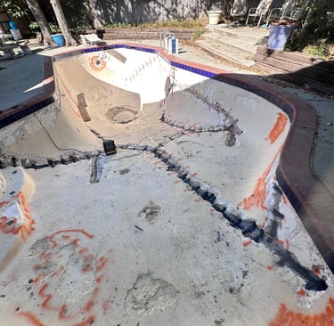 Cracks in the pool were repaired using reinforced rebar and anchoring injections