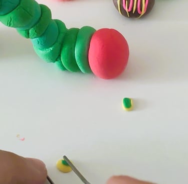 Eyes of very hungry caterpillar air-dry clay