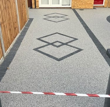resin driveway with a black and white pattern by PC Drivestyle Ltd