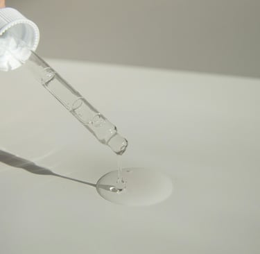 a person holding dropper with facial oil