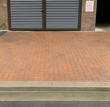 Dumpster pad cleaning service in Tacoma WA, using heated pressure washer