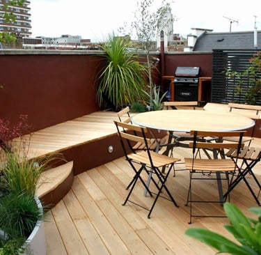 Stylish terrace garden with seating and planters in Bangalore