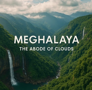 Meghalaya hills covered in clouds with waterfalls and lush greenery