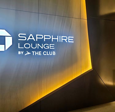 Chase Sapphire Lounge by The Club entrance sign with Chase logo, JFK Terminal 4