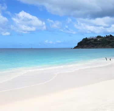 Ffryes Beach Antigua – empty white sand beach with calm turquoise Caribbean water