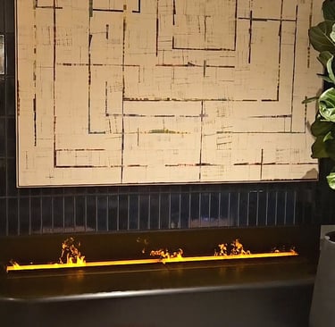 Fireplace with cozy seating area at Chase Sapphire Lounge JFK Terminal 4