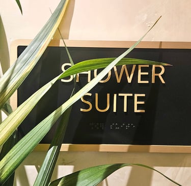 Shower suites sign inside Chase Sapphire Lounge JFK Terminal 4