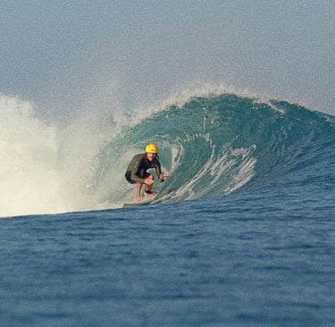 a surfer is riding a wave in the ocean