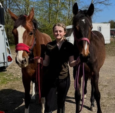 Rosie Shaw holding her horses