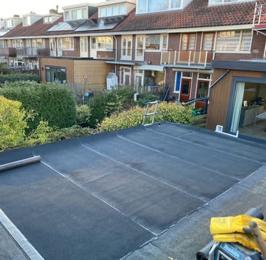 a man is working on a roof with a hammer hammer