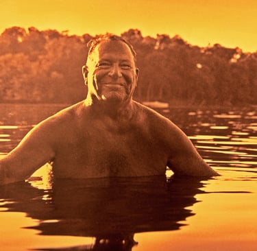 portrait of man cooling off in water