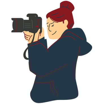 picto d'une photographe aux cheveux auburn