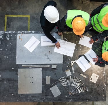 construction workers discussing a project houston commercial contractor