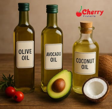 – Botellas de aceite de oliva, aguacate y coco en una mesa.
