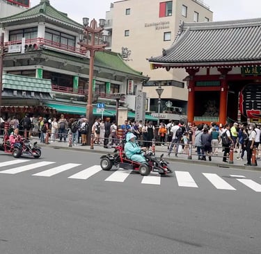 Go-karts passing in front of Kaminarimon Gate in Asakusa, Tokyo