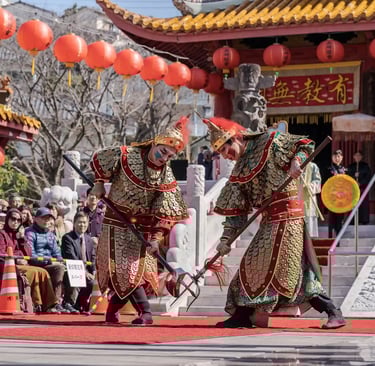 Performers in traditional Chinese costumes dancing at Confucius Shrine during the Nagasaki Lantern F