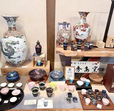 Traditional Arita porcelain with blue and white designs on display