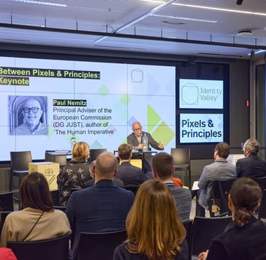 Paul Nemitz standing at a lectern in front of an audience.