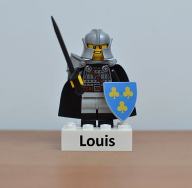 a lego - style lego - man holding a sword and shield