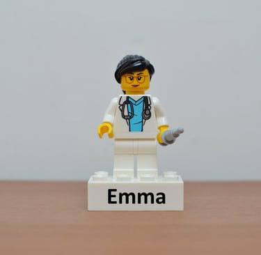 a lego - style lego - man with a name tag on it