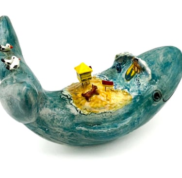 ceramic whale, beach, high tide, seagulls, dog, lifesaving, surfer, sand, flag
