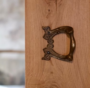 a door handle on a wooden door, interior design, French country home, normandy, antique, France