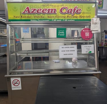 Azeem Cafe food stall in Malaysia serving Nasi Kandar and Ayam Goreng Bawang.