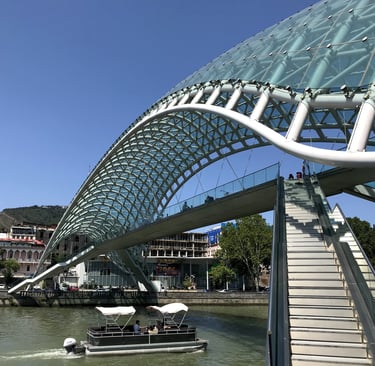 the Bridge of Peace spanning the Mtkvari River in Tbilisi, Georgia