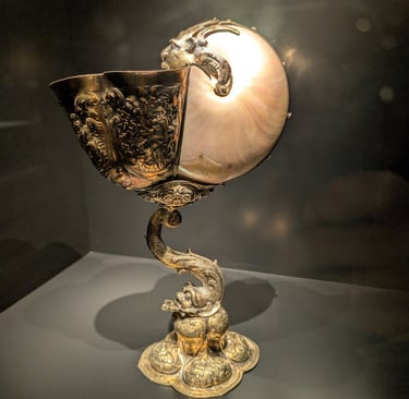 a nautilus shell chalice in with intricate gold work housed in the Hungarian National Museum