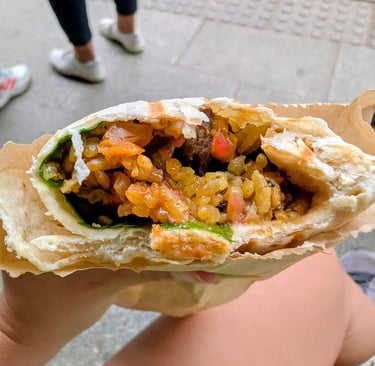 A plove wrap filled with rice, meat and vegetables in Belgrade Serbia