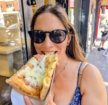 Samantha eatting fresh a Pizza slice in Belgrade Serbia 