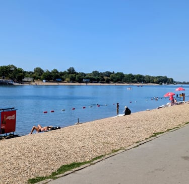 beautiful rock beach and man made lake in park Ada Ciganlicja, Belgrade, Serbia 