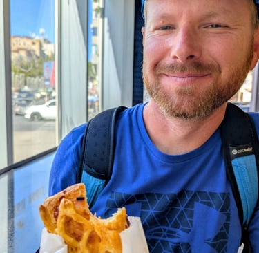 Don eatting a Pastry filled with ham and cheese Belgrade, serbia